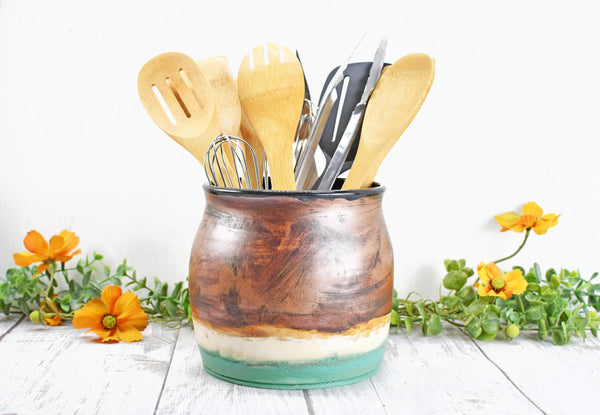 Large Copper, White and Green Ceramic Utensil Holder Crock for Kitchen Countertop. Pottery Organizer in Turquoise Green and Cream filled with spoons and spatulas. Camille Woodward artist wheel thrown.